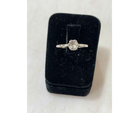 Solitaire diamond (approx 0.75 carat), platinum and 18 carat white gold ring, size R.