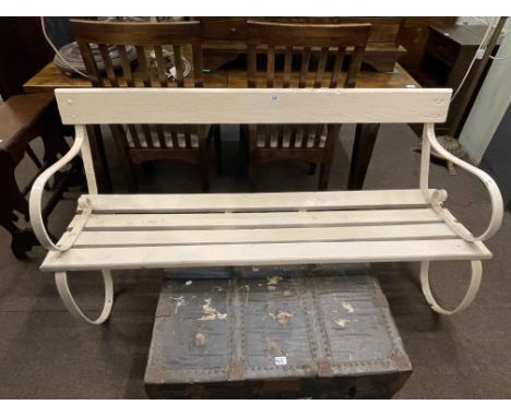 Painted wrought metal and wood slat scroll arm garden bench, 151cm in length.