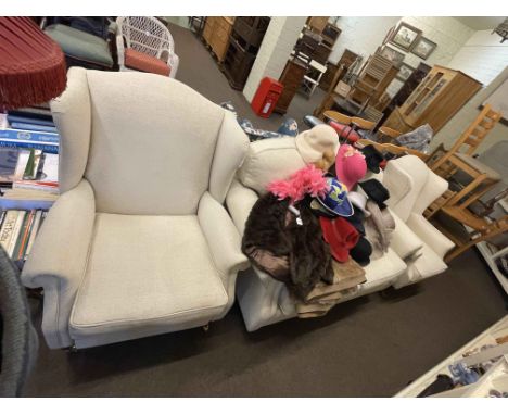 Contemporary three piece lounge suite in light fabric comprising two wing armchairs including one recliner and two seater set