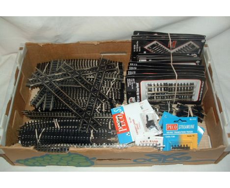 A quantity of Mint packaged or Near Mint Track by ATLAS and other Track mostly Mint by LIMA, HORNBY and PECO.