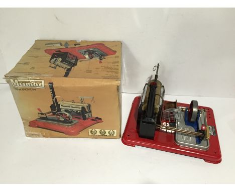 MAMOD SP4 Horizontal Steam Engine with burner driving a single oscillating cylinder through a 2.5" flywheel. Good Plus in a G
