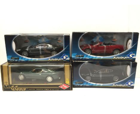 Three 1/18 scale Solido models: 8163 Aston Martin DB9 Volante 2005; 2 x 8162 Aston Martin DB9 2004. M and boxed. Together wit