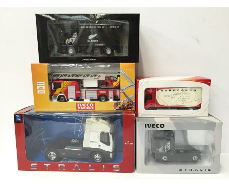 Five Iveco diecast models: WSI Collectibles 9229 Iveco Stralis 4x2; Norev Eurocargo 2008 All Blacks; Eligor Eurocargo truck; 