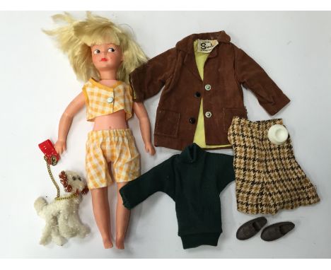 Pedigree (England) Patch doll with blonde hair (F, small blue mark to face). Together with a Sindy wardrobe containing a good