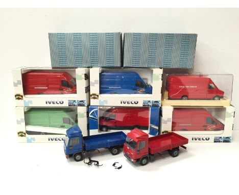 Five Agritec Models (Cologne) Iveco Daily 1/43 scale diecast vans, together with an Old Cars Iveco Van in perspex case and tw