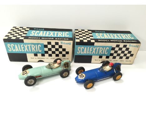 Two Triang Scalextric MM/C54 Lotus racing cars: one blue with RN '10', yellow hubs, driver with red helmet  (G/F in G/VG box)