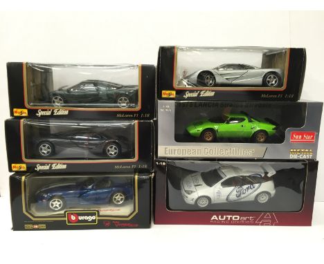 Six 1/18 scale diecast racing cars by Maisto, Bburago and others, includes Sun Star #4522 Lancia Stratos Stradale Verde (M in