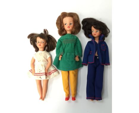 Three Pedigree (England) 1960's Sindy Dolls: Made in England Sindy, with side-glancing eyes, auburn hair, h.29cm; Mini Sindy 