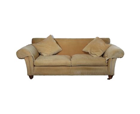 A LARGE GOLD CHENILLE STYLE TWO SEAT SOFA BY DURESTA. with roll arms and feather filled cushions in shimmering gold chenille 