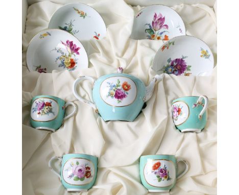 A MEISSEN PORCELAIN TEA SERVICE. to include four cups and saucers and one tea pot, housed within a fitted case, the cups havi