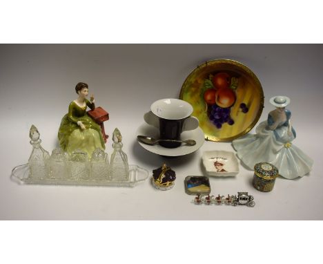 A Royal Doulton figure, Carolyn HN2974; a Coalport figure, Hayley; a Rosenthal monochrome trembleuse two handled cup and sauc