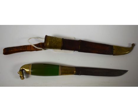 A Middle Eastern dagger, 9.5cm blade, horse head pommel, brass mounted leather scabbard, 22cm long