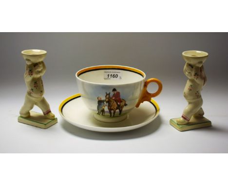 A large Royal Worcester breakfast cup and saucer, designed by H R Millais, painted by J Hendry, signed, with a huntsman; a pa