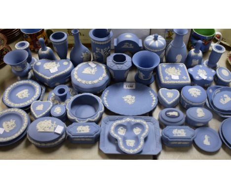 Wedgwood Jasperware - a pair of candlesticks, trinket boxes and dishes, vases, bells, desk clock, etc, qty