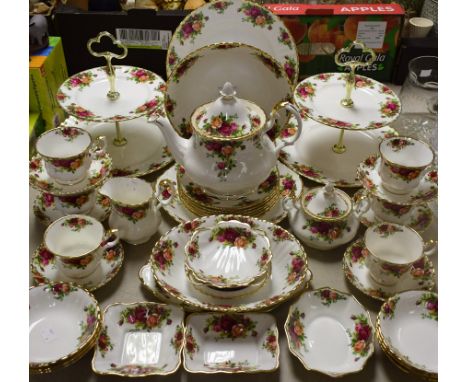 Royal Albert Old Country Roses - a six setting tea service, comprising teacups, saucers, side plates, two tier cakestands, sa