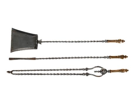 A SET OF THREE VICTORIAN POLISHED STEEL AND BRONZE HANDLED FIRE TOOLS  CIRCA 1850  Comprising shovel, tongs, and poker, each 