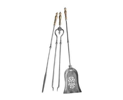 A SET OF THREE REGENCY BRASS HANDLED STEEL FIRE TOOLS EARLY 19TH CENTURY With foliate leaf clasped handles the shovel 76cm lo
