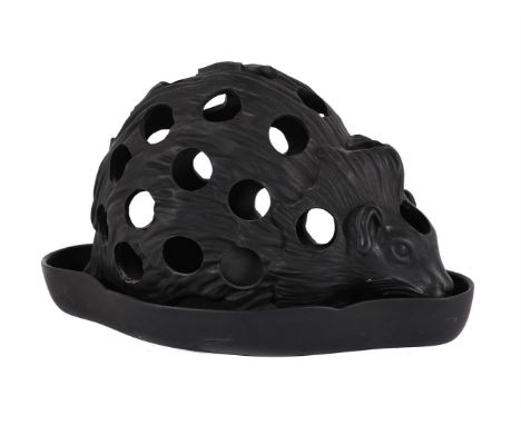 A WEDGWOOD BLACK BASALT HEDGEHOG CROCUS POT AND TRAY CIRCA 1810-1820  The back of the rodent pierced for bulb-shoots  Impress