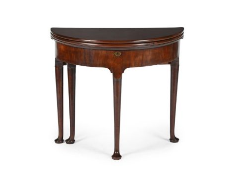A GEORGE II COMBINED TEA AND CARD TABLE  CIRCA 1740  The double hinged tops enclosing a plain surface and a baize surface wit
