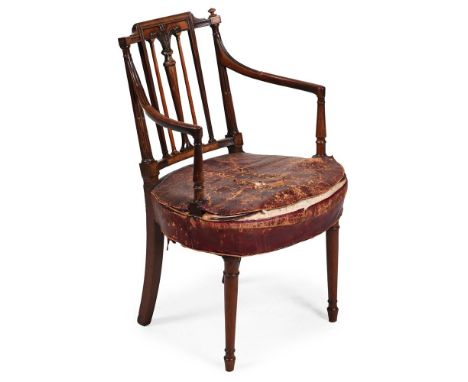 A GEORGE III CARVED MAHOGANY ARMCHAIR, IN THE MANNER OF THOMAS SHERATON  CIRCA 1780  With plume of feathers to the back above