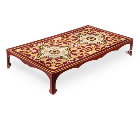 A CHINESE IRON RED AND PARCEL GILT LOW OR COFFEE TABLE 20TH CENTURY, POSSIBLY RETAILED BY MALLETT The glazed top enclosing a 