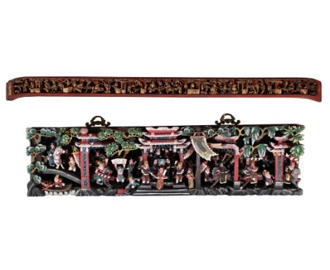 A CHINESE CARVED WOODEN POLYCHROME PAINTED DEEP RELIEF PANEL 25.5cm high, 104cm wide, 10cm deep TOGETHER WITH Another slim ca