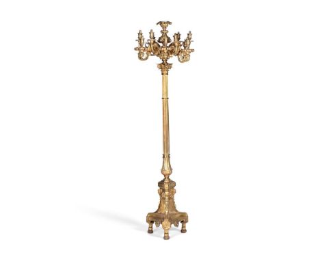 A LARGE FRENCH GILT BRONZE STANDARD THIRTEEN LIGHT CANDELABRA OR TORCHERE   IN LOUIS XV STYLE, 19TH CENTURY Flared floral top