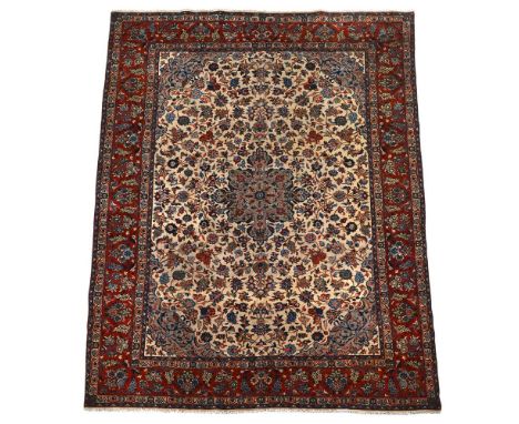 A KASHAN CARPET approximately 340 x 253cmPlease note the original measurements were incorrect this rug is 340 x 253cm not as 