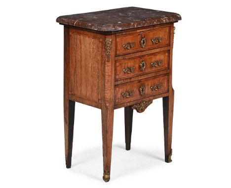 Y  A LOUIS XV OR XVI TRANSITIONAL PERIOD TULIPWOOD, GILT METAL MOUNTED AND MARBLE COMMODE FRENCH, THIRD QUARTER 18TH CENTURY 