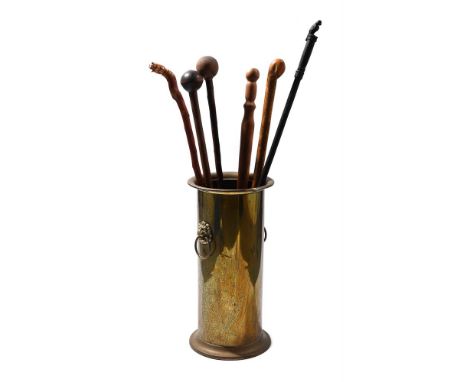 A GROUP OF SIX WOODEN WALKING STICKS the shortest approximately 90cm, the longest approximately 112cm  TOGETHER WITH A two ha