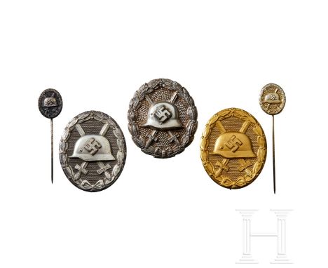 A Small Collection of Wound BadgesGold badge, maker “30”, struck solid, gilt finish with vertical pinback, dimensions approx.