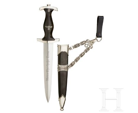 A Model 1936 SS Service Dagger with Chain HangerNo maker, polished steel blade with etched motto. Silver-plated grip fittings