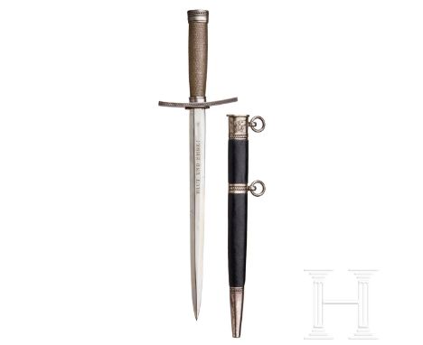 A dagger M 37 for Hitler Youth leaders, with hanger. Maker M7/36, E & F  Hörster, Solingen. Plated blade, the obverse side etched with the motto  Blut und Ehre! (Blood and Honour!). The reverse etched RZM and M7/36.  Silver-plated cross