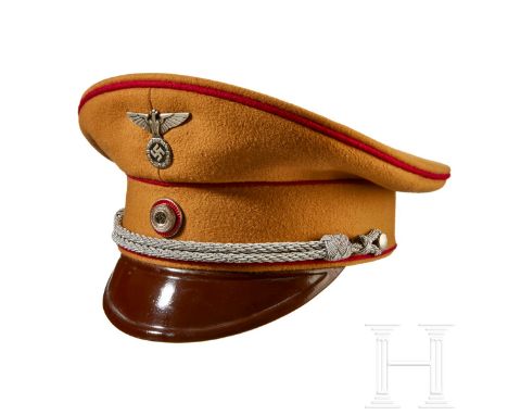 A Visor Cap for NSDAP Leaders in the GauleitungTan doeskin, tan wool center band, red wool piping, silver-aluminum braided ch