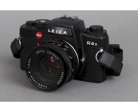 mit Summicron-R 1:2/50 Objektiv (Leitz Canada), schwarzes Gehäuse mit Seriennummer1645149 (Leitz Portugal), dazu diverse Anle