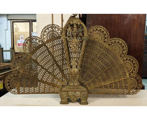 FIRESCREEN, late 19th/early 20th century brass, of fan form, 70cm H x 99cm open 20cm closed. 