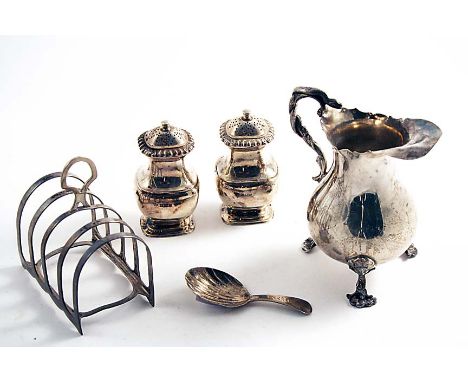 A SMALL MIXED LOT:- A George III baluster cream jug on three cast female mask legs with a serpent and scroll handle, no maker
