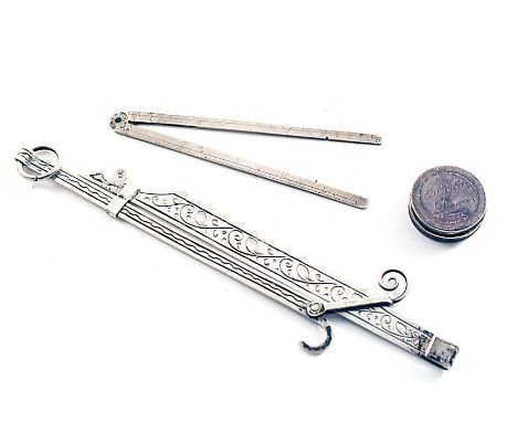 THREE SMALL ITEMS:- A 19th century miniature or toy fire jack with ratchet adjustment, initialled, probably Dutch, unmarked, 