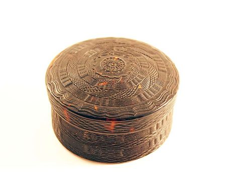 AN EARLY 18TH CENTURY TORTOISESHELL SNUFF BOX & COVER circular, decorated overall with rose engine-turning, the centre of the