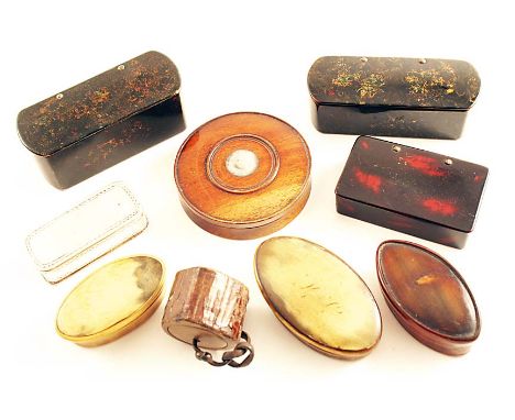 THREE VARIOUS 19TH CENTURY LACQUERED PAPIER MACHE SNUFF BOXES, a circular turned wooden snuff box with an inset boss on the c