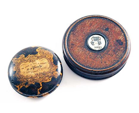 A SMALL CIRCULAR MAUCHLINE-WARE SNUFF BOX with pen work and the inscription "He that is not a friend, at a Pinch is not worth