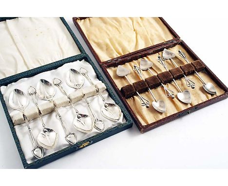 AN EDWARDIAN CASED SET OF SIX COFFEE SPOONS with heart-shaped bowls and wirework terminals with ball finials, by A.E. Bonner,