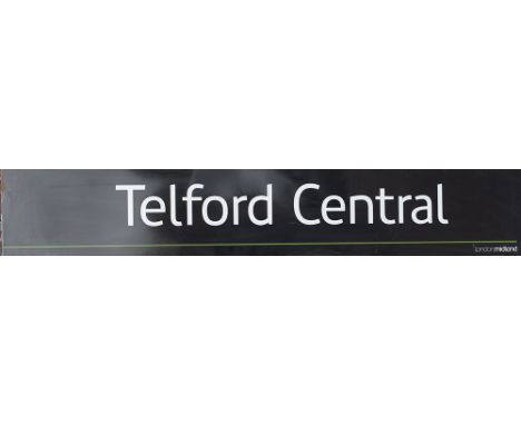 Modern image enamel station sign LONDON MIDLAND TELFORD CENTRAL. Fully flanged in excellent condition measures 82.5in x 14in.