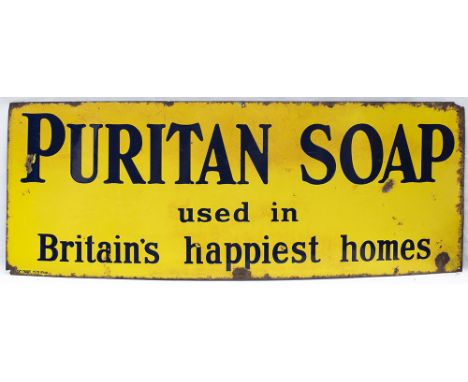 Enamel advertising sign PURITAN SOAP USED IN BRITAIN'S HAPPIEST HOMES. In good condition with some face chipping, measures 48