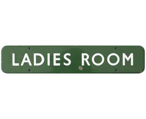 BR(S) FF enamel doorplate LADIES ROOM. In very good condition with a couple of small face chips, measures 18in x 3.5in.
