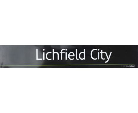 Modern image enamel station sign LONDON MIDLAND LICHFIELD CITY. Fully flanged in excellent condition measures 82.5in x 14in.