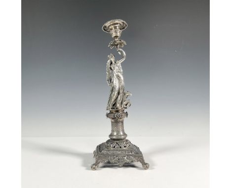 Magnificent rare silver candlestick embellished with an indian woman over camel standing on pedestal connected to a squared b