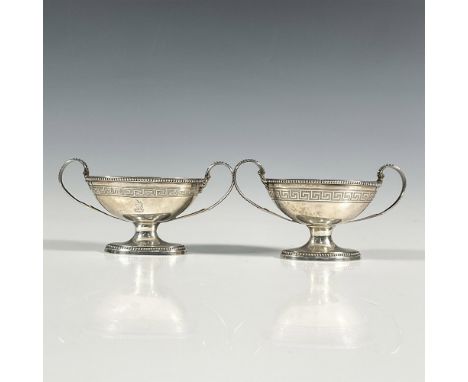 Pair of Victorian silver open salt cellars with gilt interior. Engraved with Greek scroll borders on interior and exterior, b
