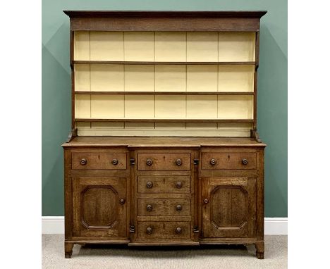 19th CENTURY OAK BREAKFRONT DRESSER - a three shelf top rack with painted wide backboards over a "T" arrangement base of thre