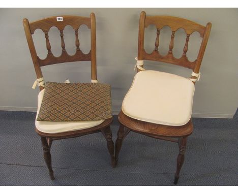 A pair of 19th century Lancashire Windsor kitchen chairs, maker's initials stamped to seat edge, R F